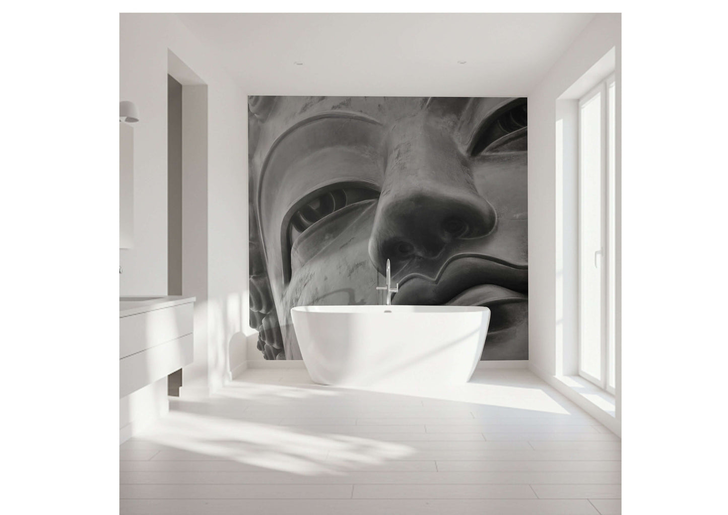 Close-up of a serene Buddha face in a stylish bathroom setting with a modern bathtub.