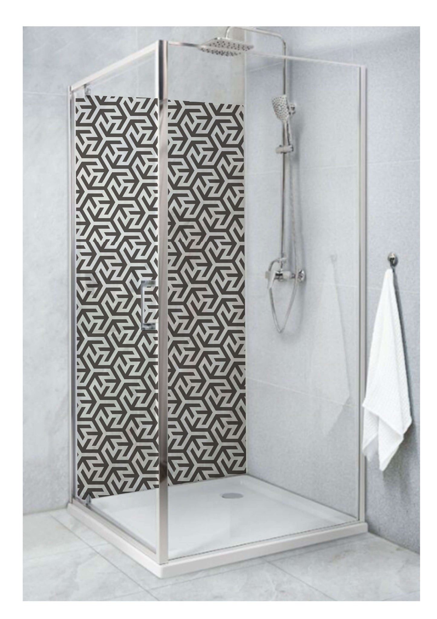 Contemporary shower enclosure featuring geometric Arabic pattern on black and white panel.