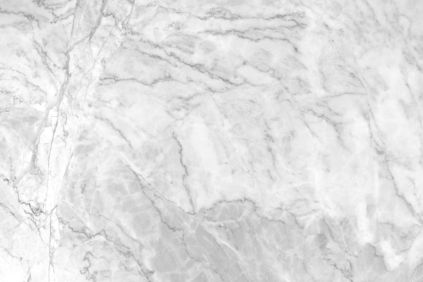 Natural marble surface with elegant veins, ideal for luxurious bathroom decor and art.