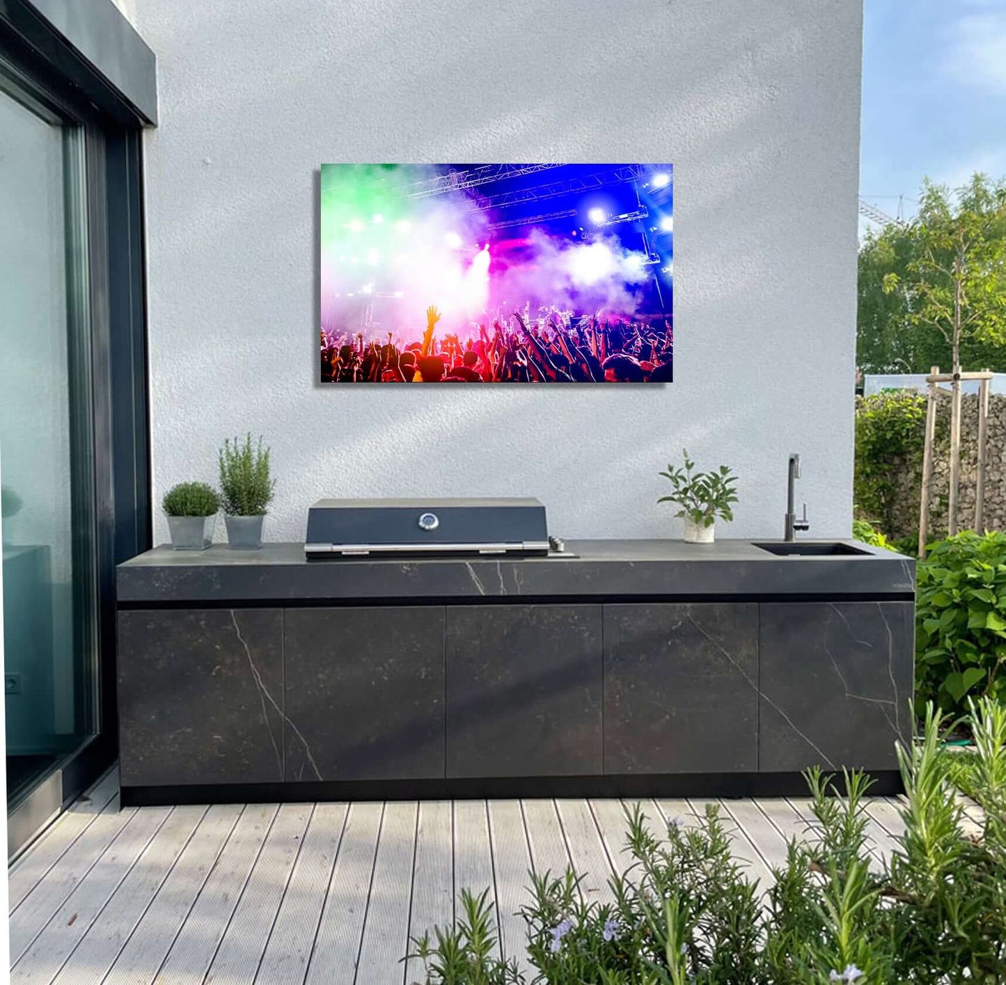 Vibrant festival artwork showcased on an outdoor wall, enhancing garden ambiance with colorful lights and energy.