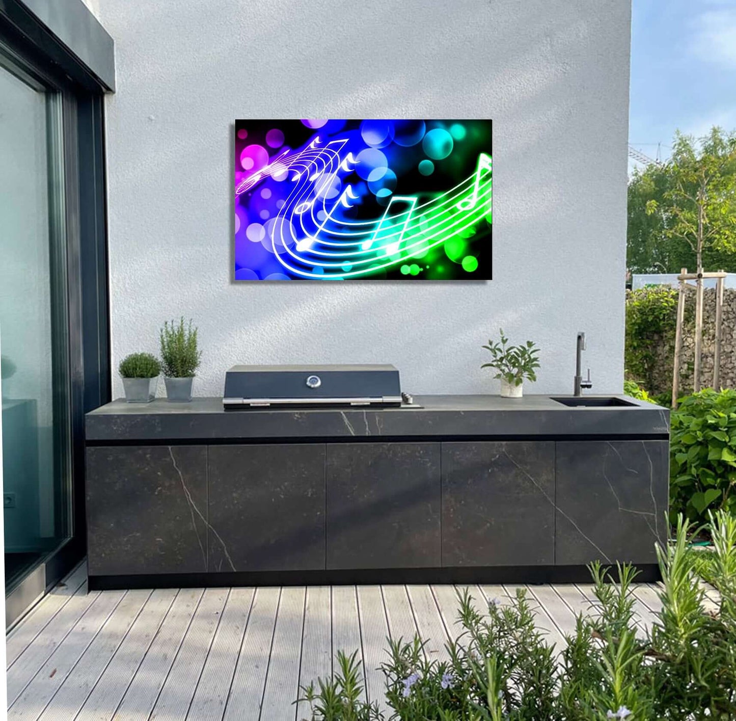 Vibrant musical artwork in garden setting, showcasing glowing notes and colorful hues on an outdoor wall.