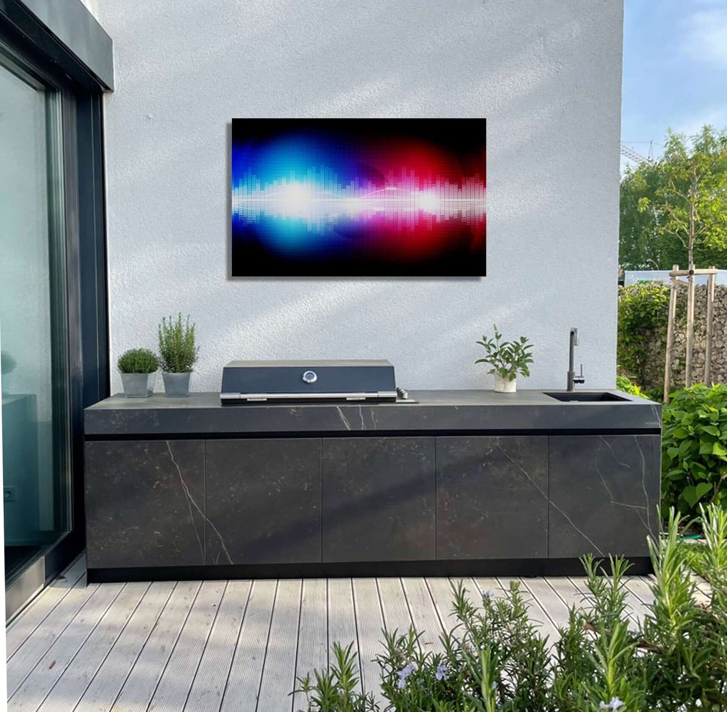 Modern outdoor kitchen featuring a bold soundwave artwork in blue and red, enhancing the space's atmosphere.