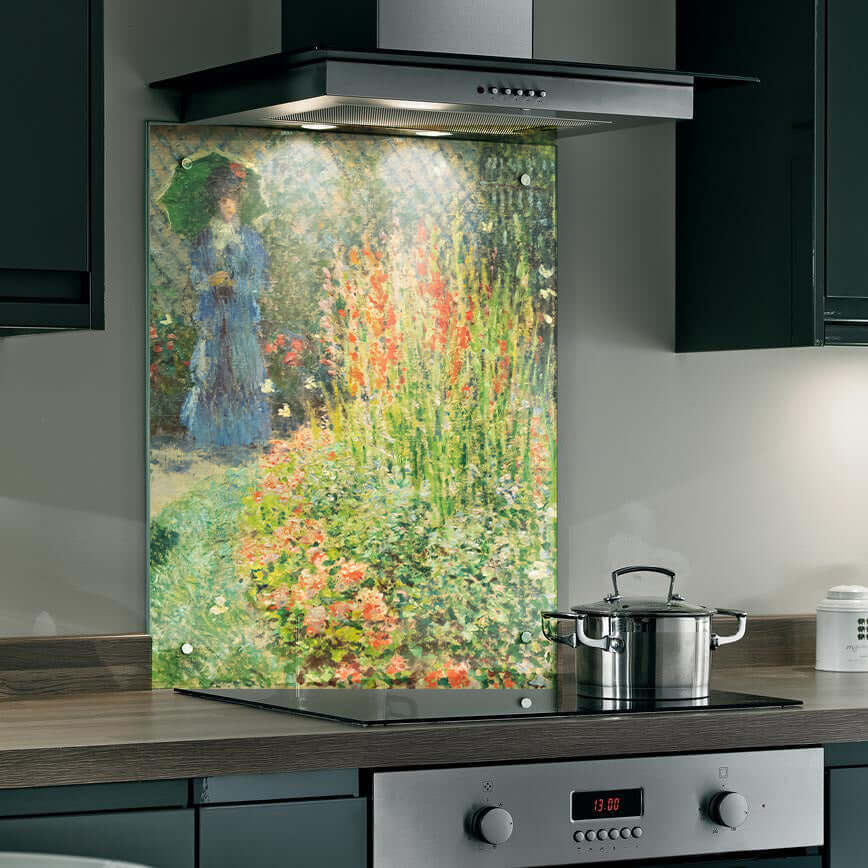 Monet's 'Lady in the Garden' printed splashback, enhancing kitchen aesthetic with vibrant colors and floral scenery.