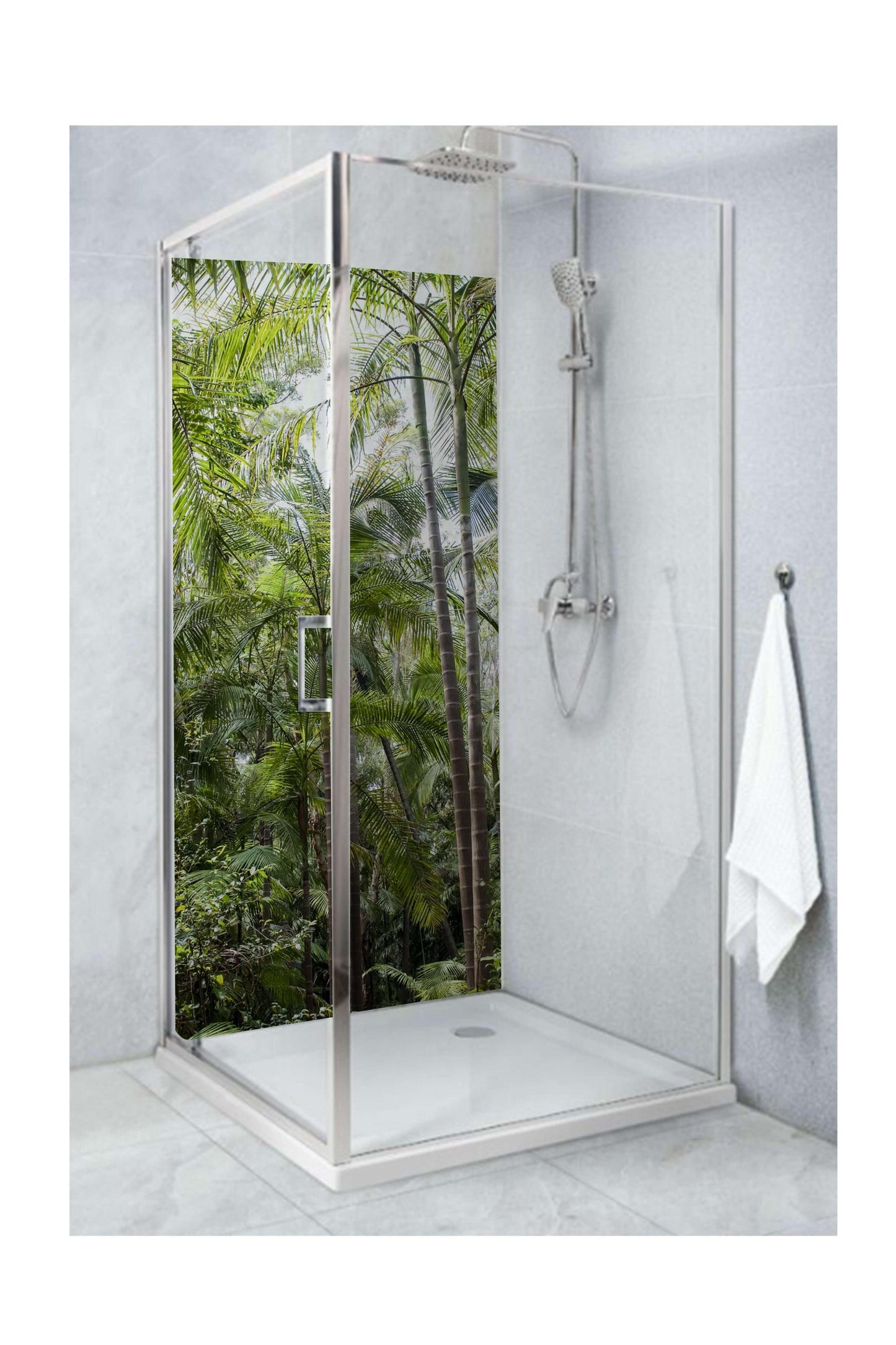 Glass shower with rainforest view, creating a nature-inspired escape in the bathroom.