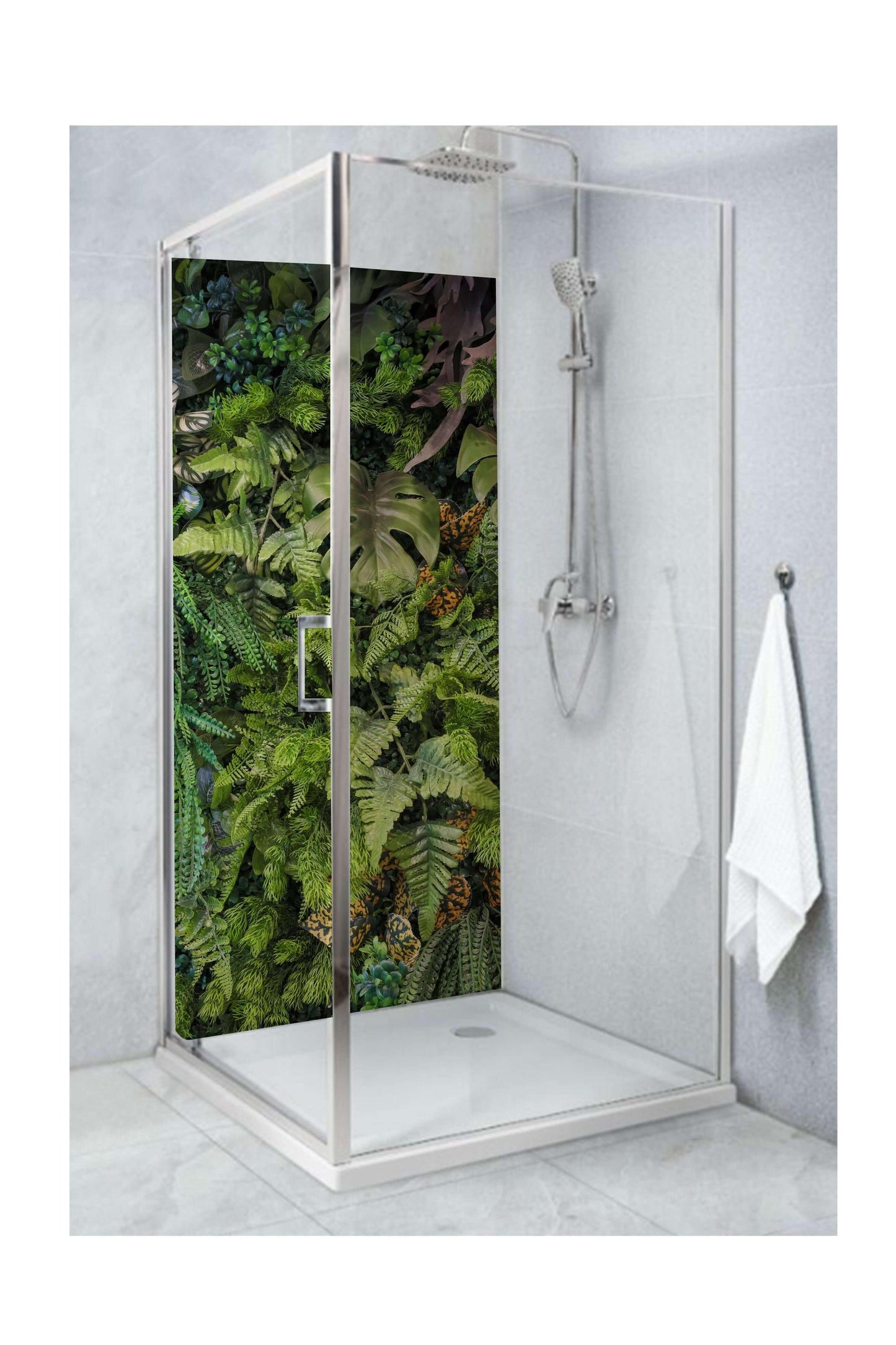 Shower with rainforest-inspired panel featuring lush greenery, creating a vibrant and fresh atmosphere.