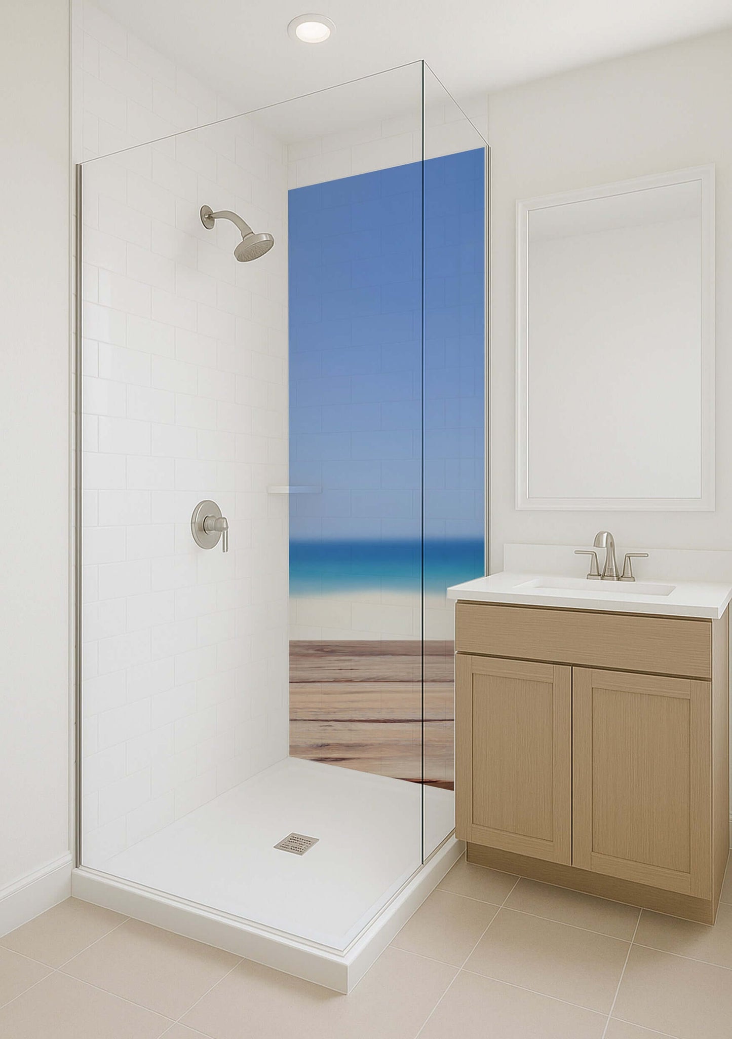 Modern bathroom featuring a glass shower with an ocean view graphic, light cabinetry, and bright ambiance.