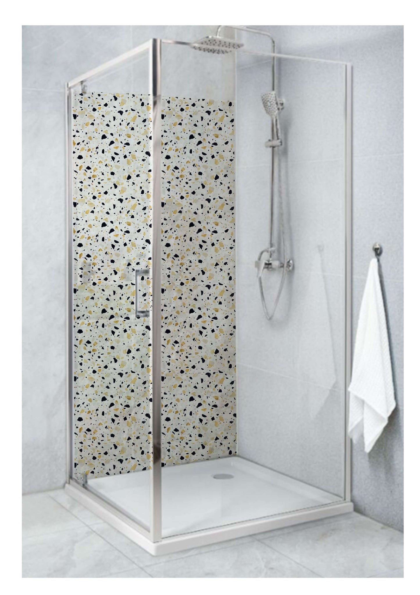 Shower with yellow terrazzo stone style panel, showcasing vibrant patterns in a modern bathroom setting.