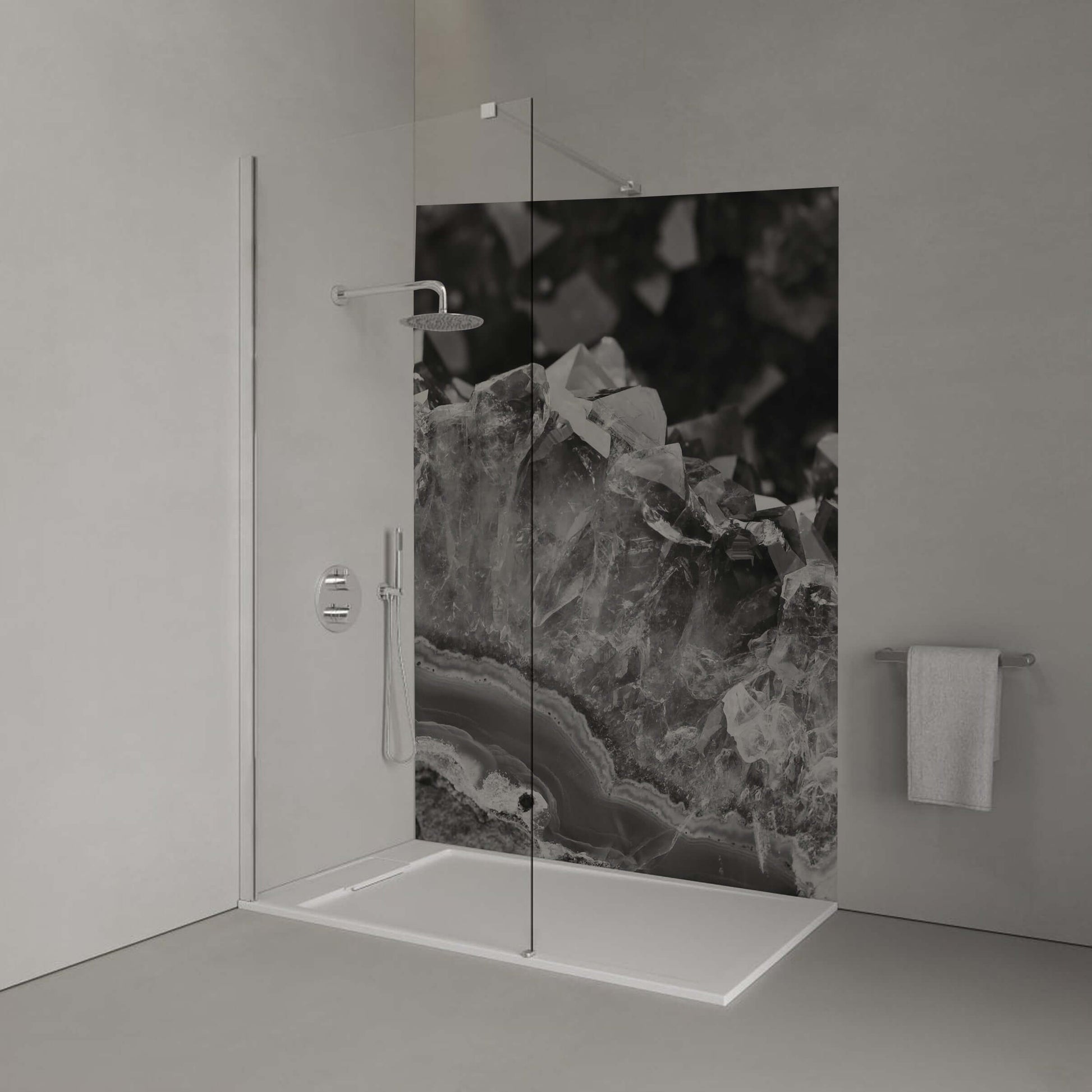 Monochrome amethyst panel in a modern shower, showcasing layered crystalline structure in black and white.