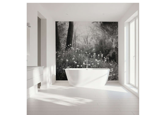 Black and white summer meadow wall art creating a serene bathroom atmosphere with a modern tub.