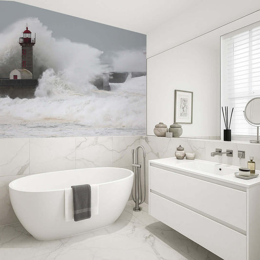 Bathroom art of huge waves crashing into a lighthouse, showcasing vibrant nature in a stylish shower panel.