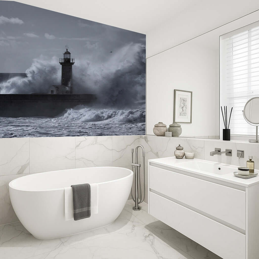 Bathroom with lighthouse and crashing waves mural, featuring moody grey tones and vibrant details.