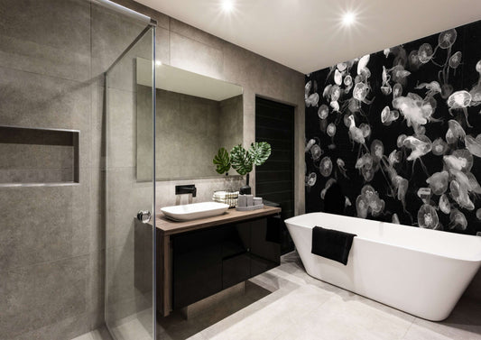 Sleek bathroom featuring monochrome jellyfish art panel, modern fixtures, and a serene atmosphere.