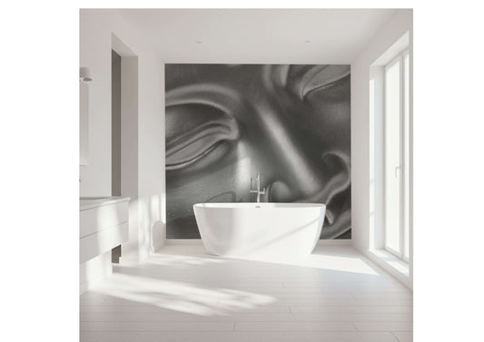 Close-up of a metallic Buddha head wall panel in a modern bathroom setting, enhancing the shower experience.