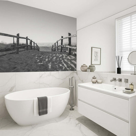 Black and white bathroom panel featuring a pathway leading to the beach, enhancing shower aesthetics.