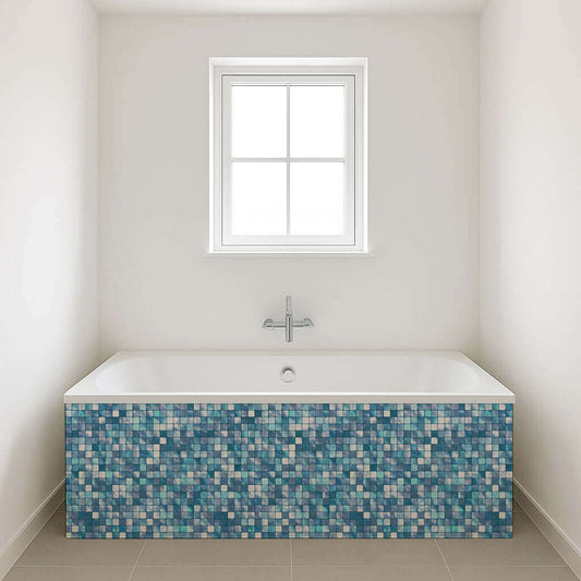 Elegant blue mosaic effect tiles adorning a modern bathtub in a serene bathroom setting.