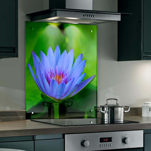 Vibrant blue lotus flower splashback in a modern kitchen, bringing calm and clarity to the space.