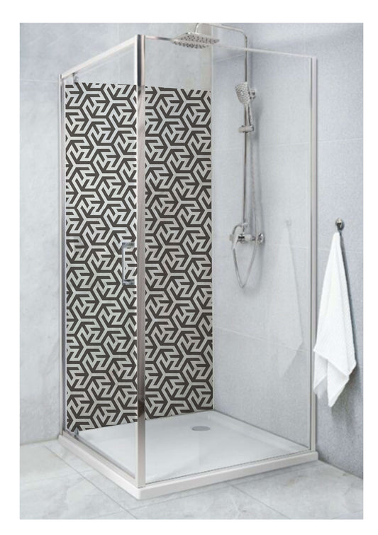 Contemporary shower enclosure featuring geometric Arabic pattern on black and white panel.