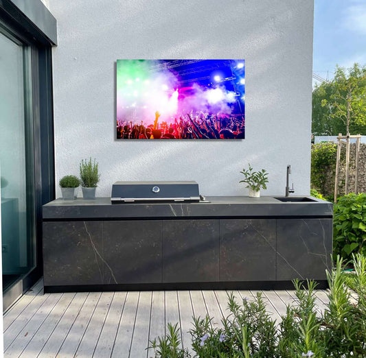 Vibrant festival artwork showcased on an outdoor wall, enhancing garden ambiance with colorful lights and energy.