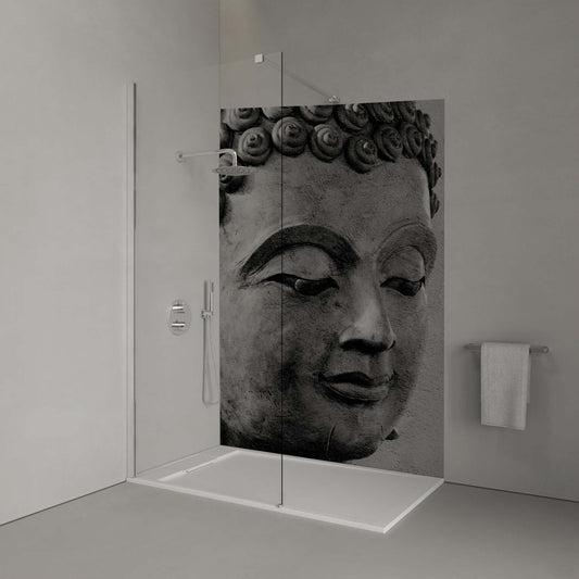 Monochrome Buddha head on a tranquil shower panel, exuding calmness and mindfulness in a minimalist bathroom setting.