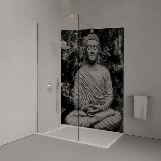 Monochrome sitting Buddha in serene meditation, enhancing bathroom tranquility and mindfulness.