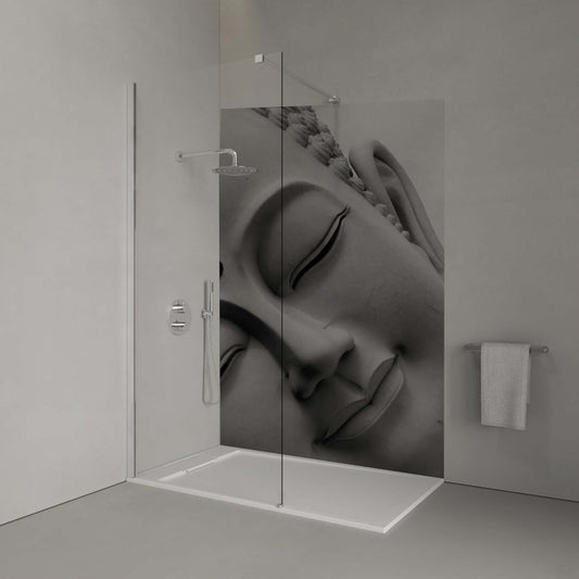 Monochrome tilting Buddha head panel in a serene bathroom setting, promoting tranquility and Buddhist-inspired décor.