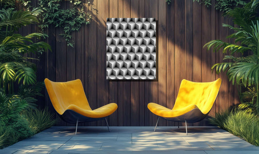 Striking black and white Echo Form art in a modern garden with yellow chairs, enhancing outdoor sophistication.
