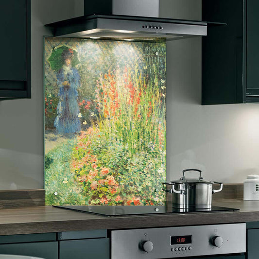 Monet's 'Lady in the Garden' printed splashback, enhancing kitchen aesthetic with vibrant colors and floral scenery.