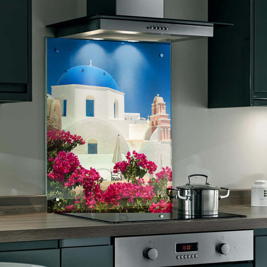 Stunning Santorini splashback featuring blue dome and vibrant pink flowers, enhancing kitchen decor with Mediterranean charm.