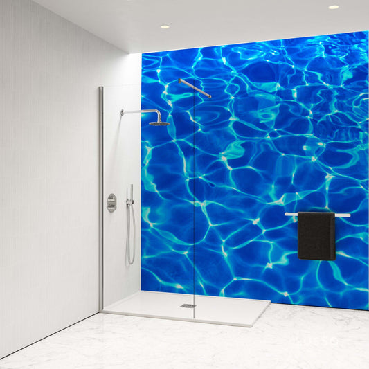 Vibrant shower panel depicting a swimming pool ripple, transforming a bathroom into a stylish oasis.