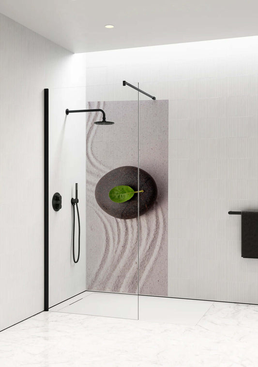 Zen Raked Sand Shower Panel by Opelli featuring dark stone, raked sand, and green leaf in a minimalistic bathroom design.