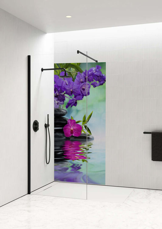 Orchid Reflection Shower Panel by Opelli featuring vivid orchids and smooth stones for a tropical bathroom retreat.