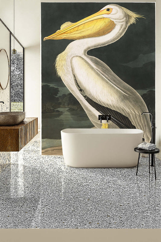 Audubon Pelican Shower Panel mural in a modern bathroom with a freestanding tub and elegant decor.