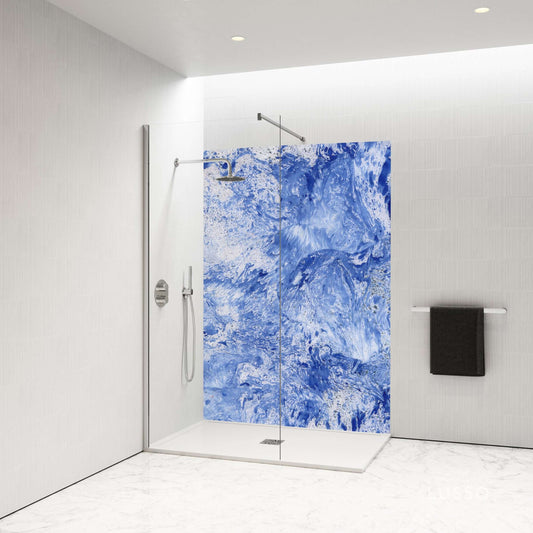 Blue Ebru shower panel featuring marbled patterns in a modern bathroom setting, evoking calmness and elegance.