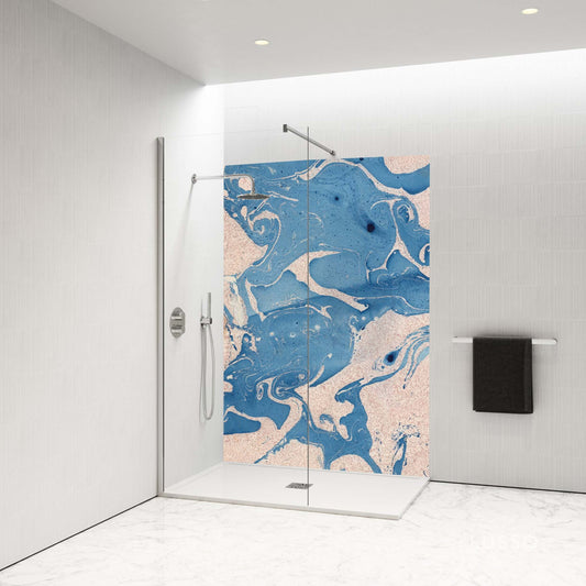 Elegant blue and white Ebru shower panel transforming a modern bathroom with marbled artistry.
