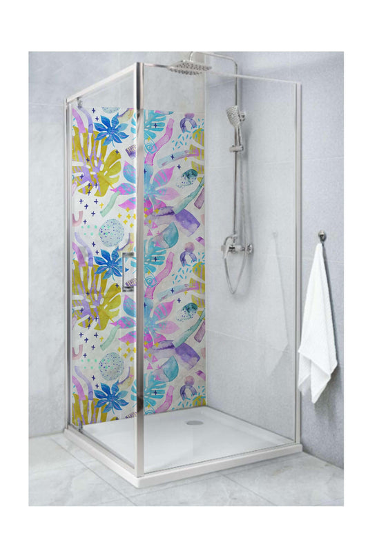 Vibrant shower panel featuring bright summer leaves and tropical patterns in a modern bathroom setting.