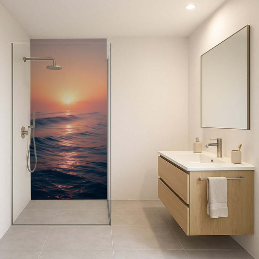 Serene bathroom featuring a stunning sunset shower panel, showcasing warm hues and calming ocean waves.