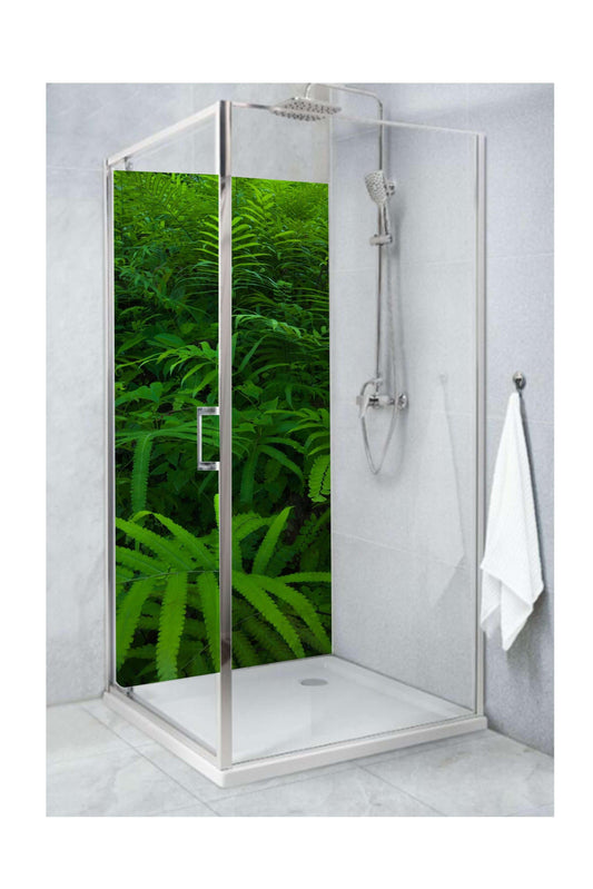 Modern shower with large rainforest leaves design, creating a serene and dramatic atmosphere.