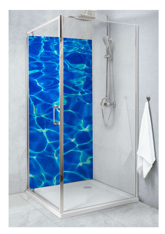 Elegant shower panel with ocean swirl design, creating a serene coastal retreat in a modern bathroom.