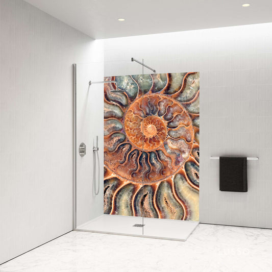 Close-up of an orange shell shower panel showcasing vibrant textures and coastal elegance in a modern bathroom.