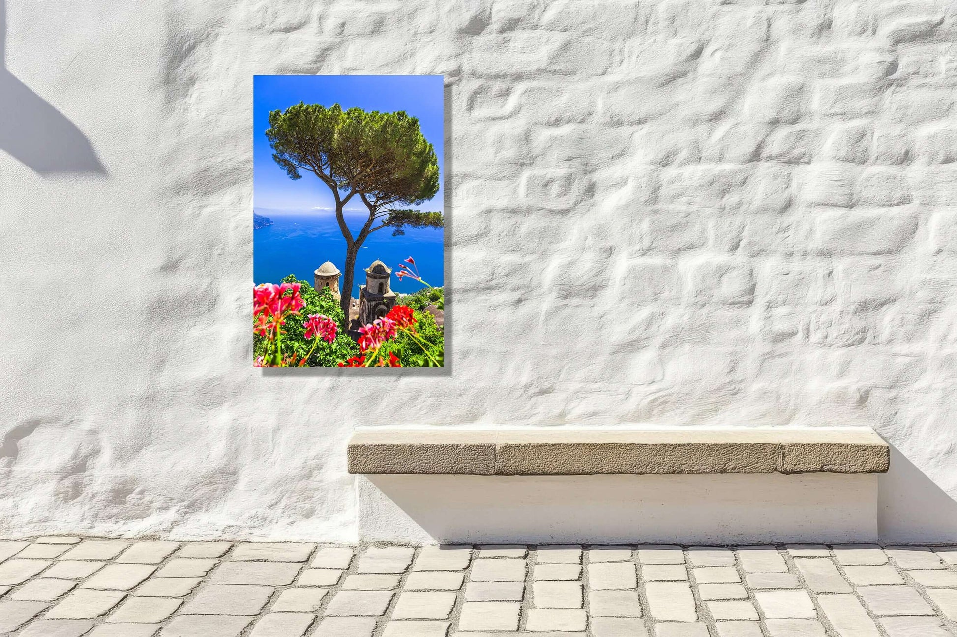 Mediterranean Vista art print featuring coastal views, vibrant flowers, and iconic pines on a textured wall.